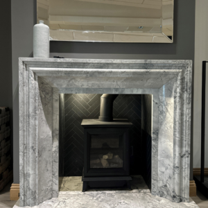 Custom-made Dolomite fireplace crafted in stone