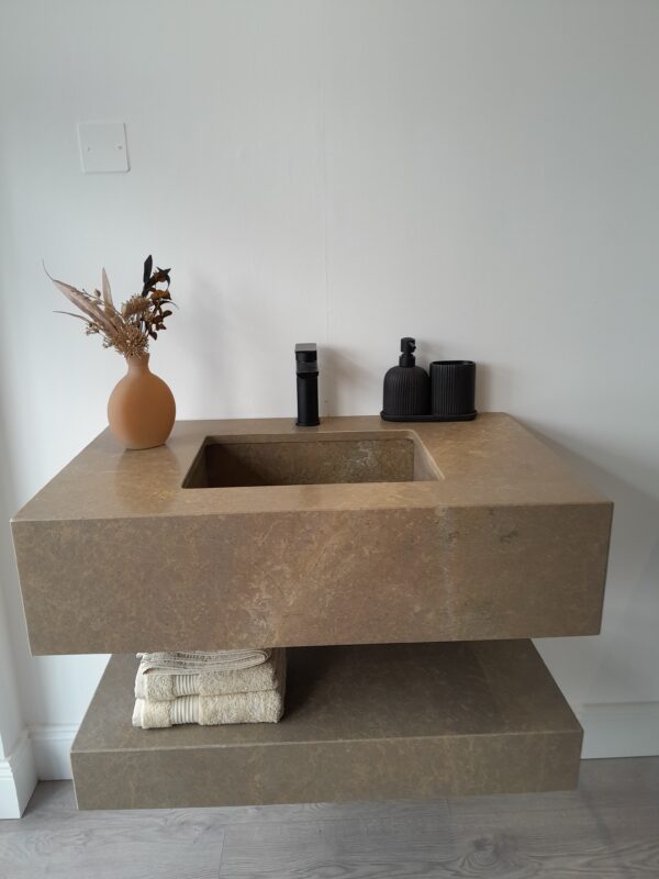 Stone bathroom vanity unit crafted in Sierra Elvira marble