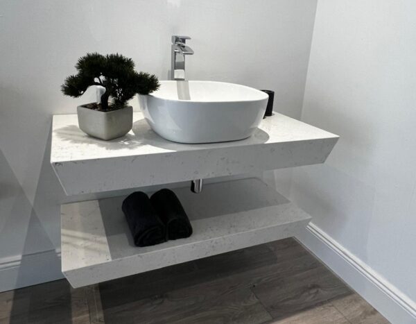 Bespoke bathroom vanity unit crafted in Crema quartz