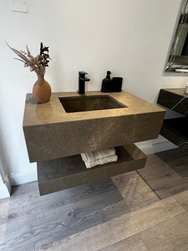 Bespoke bathroom vanity unit crafted in Sierra Elvira marble