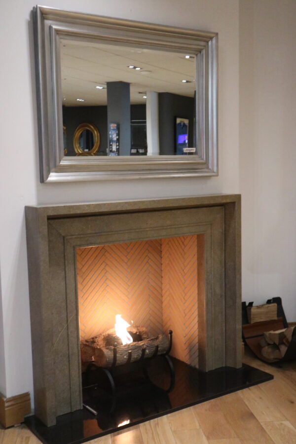 Custom-made Toscana fireplace crafted in Sierra Elvira marble with bioethanol basket fire